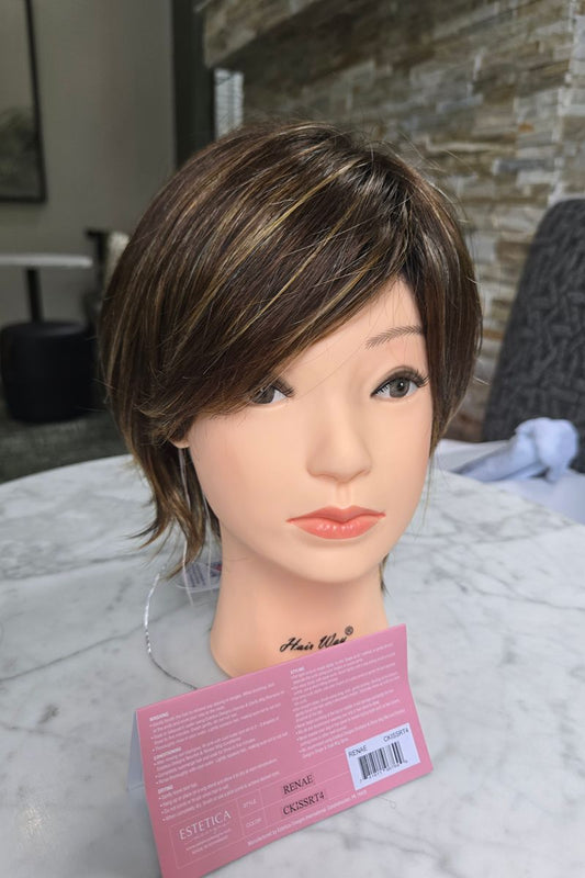 Renae Wig by Estetica is a Short Whispy Shag Style with Volume and Short Bangs. This is Color CKISSRT4 - Golden Brown with Copper Blonde Highlights and Dark Brown Roots