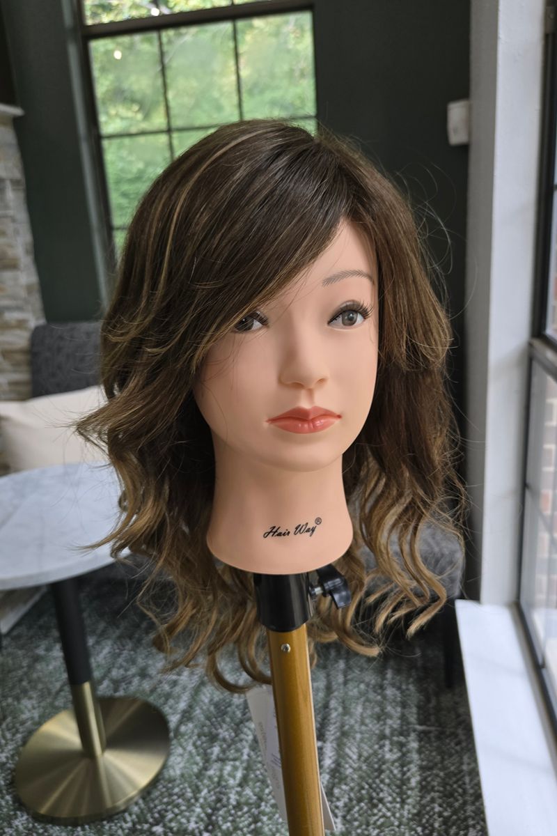 Reeves Wig in Toffee Latte which is a Light Chestnut Brown base with Painted Caramel Blonde Highlights.