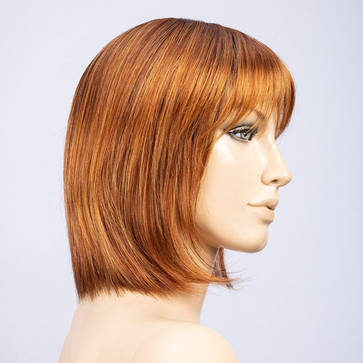 Change Wig by Ellen Wille | Synthetic Wig (Mono Crown) Ellen Wille Synthetic Safran Red Rooted | Dark Copper Red-Copper Red & Light Copper Red Blend w/ Dark Roots / Front: 2.5" |  Crown: 8" |  Sides: 5" |  Nape: 2.25" / Petite / Average