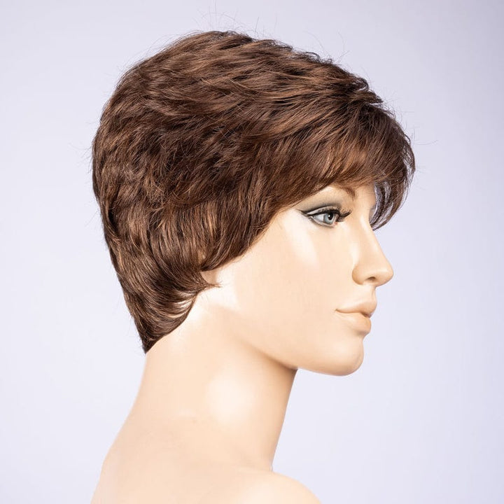 Dot Wig by Ellen Wille | Synthetic Wig (Mono Crown) Ellen Wille Synthetic Chocolate Mix | Medium to Dark Brown base w/ Light Reddish Brown highlights / Front: 2.5” | Crown: 2.5” | Sides: 1.5” | Nape: 1.5” / Petite / Average