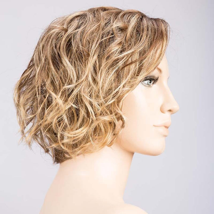 Turn Wig by Ellen Wille | Synthetic Lace Front Wig (Mono Part) Ellen Wille Synthetic Bernstein Rooted | Light Brown base with subtle Light Honey Blonde and Light Butterscotch Blonde highlights and Dark Roots / Front: 6" | Crown: 8" | Sides: 6" | Nape: 3" / Petite / Average